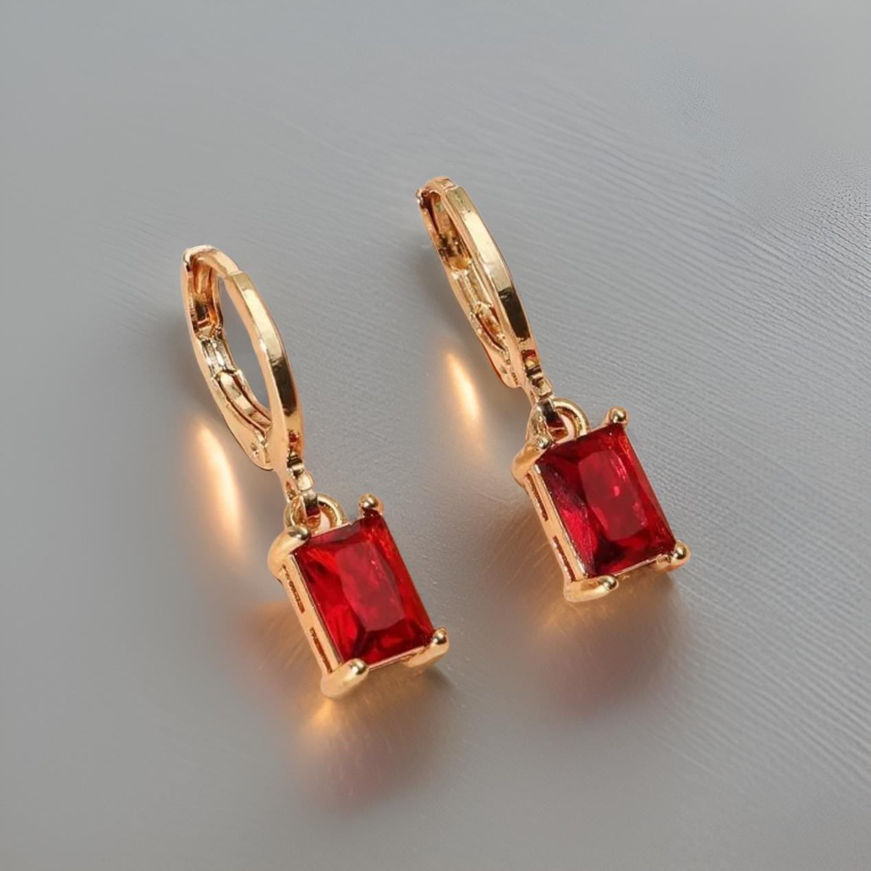 Beautiful Gold and Red Gem Huggies